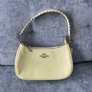 Coach yellowish-green braided strap purse